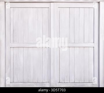 Closed white wooden gate in close-up Stock Photo