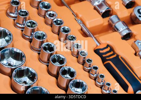 A toolbox with many different tools including pliers, wrenches, and screwdrivers. tools are organized in a way that makes it easy to find what you Stock Photo