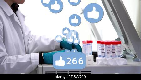 Lab tech in white coat, teal gloves handling test tubes, thermal cycler, 266 badge, copy space Stock Photo