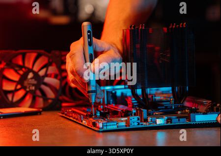Technician repairing Computer pc, Hardware maintenance Engineering Stock Photo
