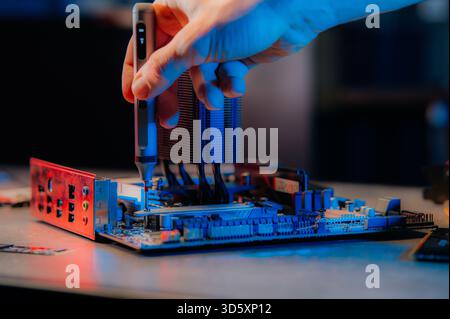 Technician repairing Computer pc, Hardware maintenance Engineering Stock Photo