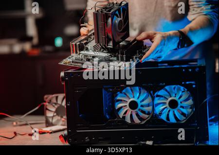 Technician repairing Computer pc, Hardware maintenance Engineering Stock Photo