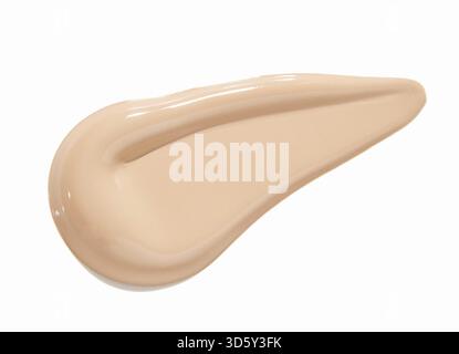 Cosmetic brown base product background. Beige paste texture. Powder face emultion smear. BB liquid sunscreen. Closeup hydrating cream. Abstract makeup Stock Photo