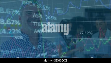 Presenting man wearing blue checked shirt and glasses leading meeting in office, with market charts Stock Photo