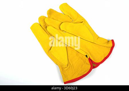 yellow leather work gloves on a white background Stock Photo