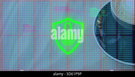 Glowing neon green shield with padlock and print rings hovering over code grid, hooded shadow right Stock Photo