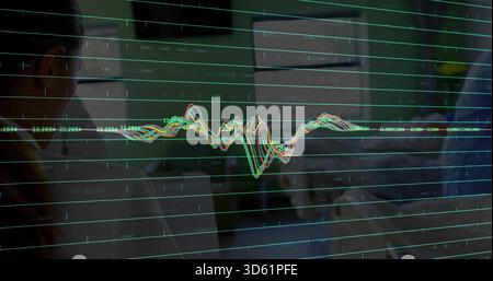 Displaying color chart on glass, tracking trends in dim office with labels and colleagues in shirts Stock Photo