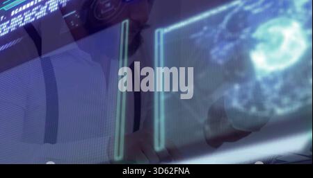Operating man wearing white shirt and dark suspenders at console, manipulating holographic globe Stock Photo