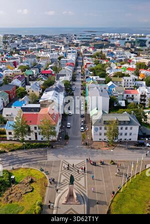 view from Hallgrimskirkja Church to Leif Eriksson monument, the colourful roofs of Reykjavik and the sea, Iceland, Reykjavik Stock Photo