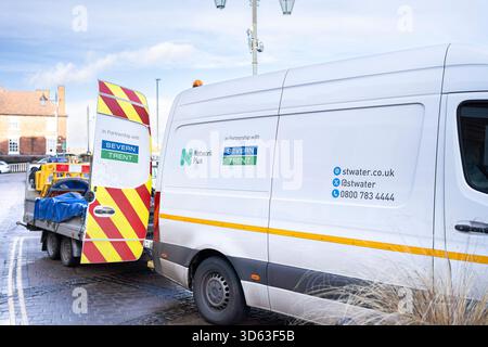 Close up side view of a Severn Trent Network Plus van, focus on the sign. Stock Photo