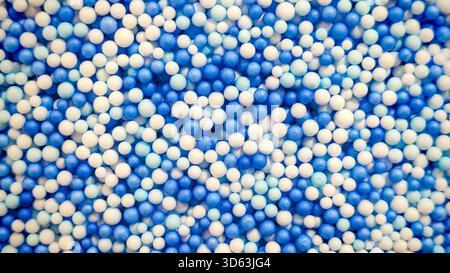 Vibrant Blue and White Polystyrene Foam Beads Texture Background Stock Photo