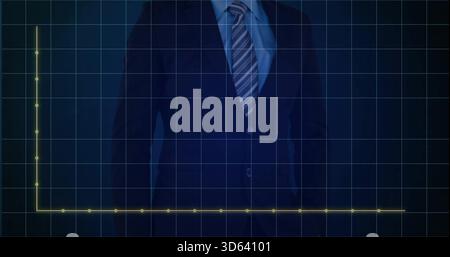 Standing mid adult man in dark suit and striped tie on presentation dashboard grid, glowing axes Stock Photo