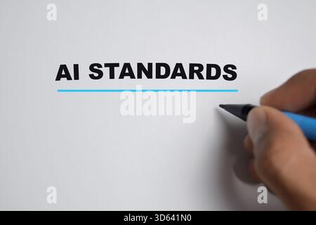 Concept of Ai standards write on book isolated on Wooden Table. For artificial intelligence guidelines, framework and ethical Stock Photo