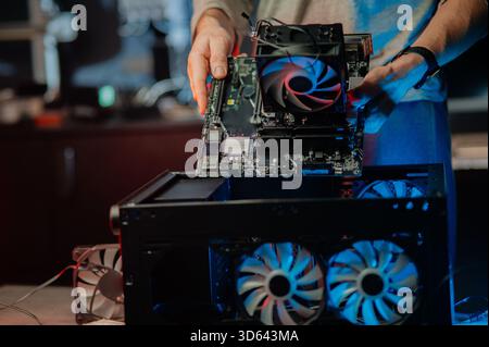 PC repair.PC spare parts. video card, motherboard, RAM, PC cooling system, hard drive, power supply with wires Stock Photo