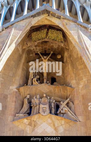 Passion façade depicting Jesus on the cross. Exterior of art nouveau style cathedral Sagrada Familia in Barcelona, Catalunia, Spain. Stock Photo