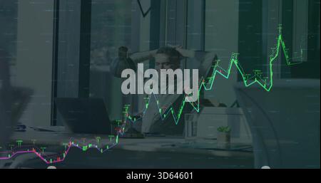 Leaning mature man resting hands behind head in modern office, wearing light shirt, laptop, charts Stock Photo