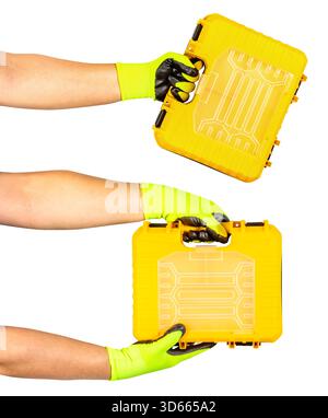 Isolated photo of worker male hands in protective gloves holding plastic yeallow tool box on white background. Stock Photo
