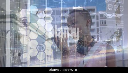 Reaching woman wearing sleeveless top, headphones using AR HUD on glass at tech lab, copy space Stock Photo