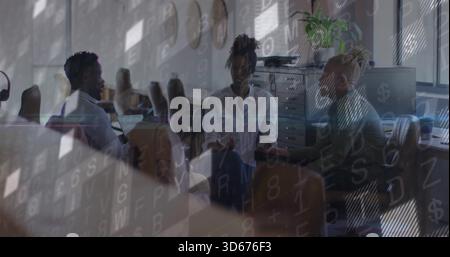 Talking, three colleagues in business casual exchanging ideas around table with overlaid numbers Stock Photo