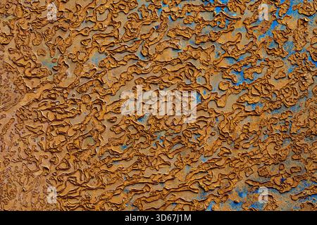 Abstract background with old rusty metal surface, close up. Orange worn rusty metal texture Stock Photo
