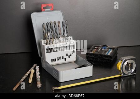 drill bit box view from above against white wall Stock Photo