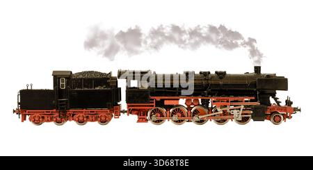 Vintage large black toy train locomotive with steam isolated on a white background Stock Photo