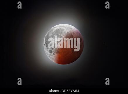 Half lit Blood moon - Total Lunar eclipse taken on March 14, 2025, over Ottawa, Canada Stock Photo