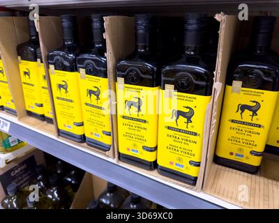 Winnipeg, Manitoba, Canada - 05-08-2023: A view of several bottles of Terra Delyssa extra virgin olive oil, on display at a local grocery store. Stock Photo