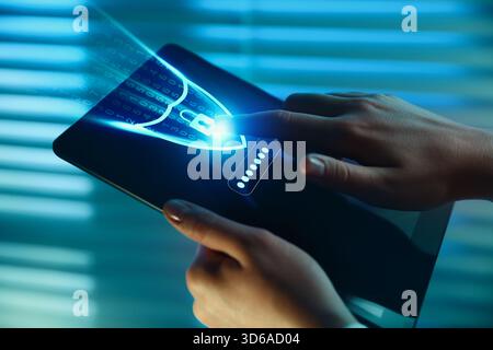 Password required to unlock tablet computer. Woman with device touching virtual shield, closeup. Cyber security and data protection concept Stock Photo