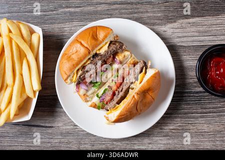 A top down view of a cheeseburger. Stock Photo