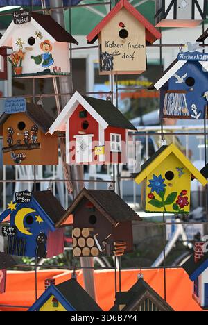 Colorful Birdhouses at the Market – Hand-Painted Beach Huts and Fishermen Idyll Stock Photo