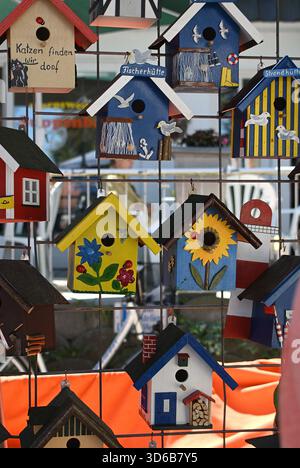 Colorful Birdhouses at the Market – Hand-Painted Beach Huts and Fishermen Idyll Stock Photo