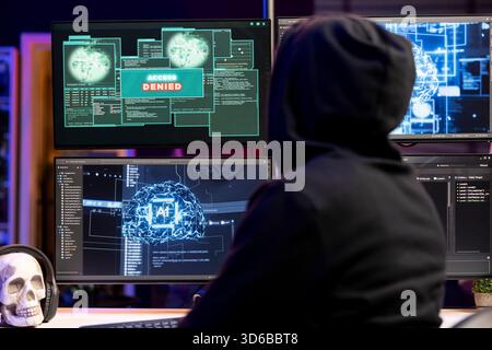 Cybercriminal seeing access denied warning on computer display when hacking firewalls. Rogue programmer failing to break into protected database, getting cyber attacks rejected Stock Photo