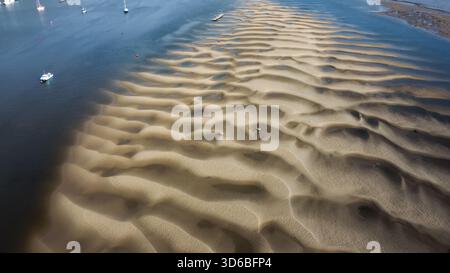Aerial view of rippled sandbank patterns at low tide Stock Photo