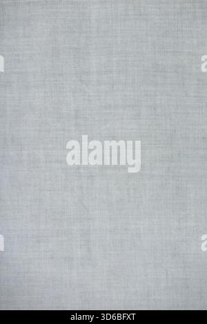 Linen fabric texture background. Neutral linen fabric close-up with soft natural light, perfect for textile design or eco lifestyle themes. Stock Photo