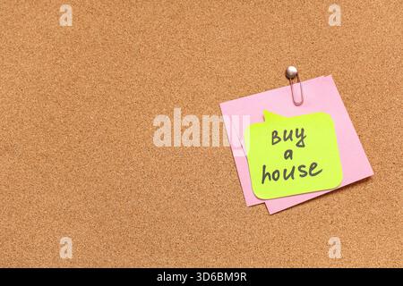 Sticky notes with reminder on cork board as background, closeup Stock Photo