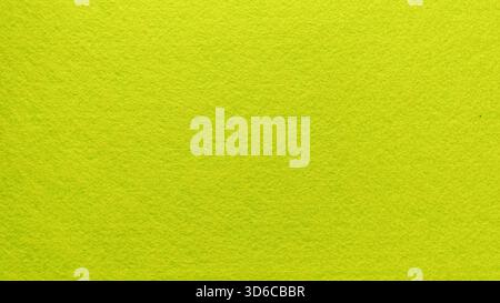 Bright Lime Green Felt Fabric Material Texture Background Displaying Rough Surface and Full Frame Copy Space Stock Photo