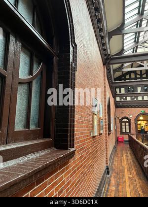 Close up shot of the Tudor-style courtyard facade in Shanghai's former Astor House Hotel (Now Shanghai Securities Museum) Stock Photo
