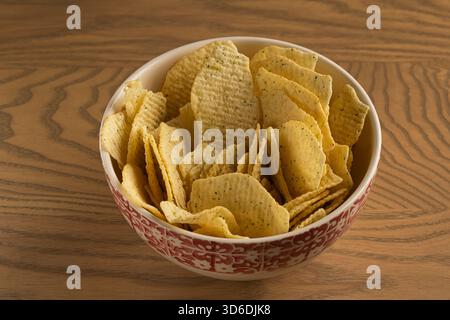 Extreme Macro Texture of Ruffled Potato Chips with Green Seasoning Stock Photo