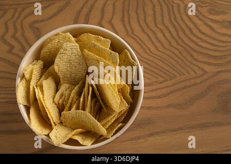 Extreme Macro Texture of Ruffled Potato Chips with Green Seasoning Stock Photo