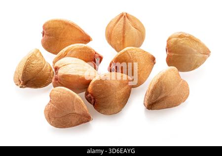 Several buckwheat grains isolated on white background.  Macro. Stock Photo