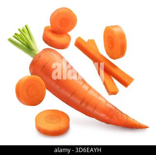 Red carrot with round carrot slices levitating in air isolated on white background. File contains clipping paths. Stock Photo