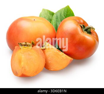Ripe persimmon fruits, persimmon slices and green leaves on white background. File contains clipping paths. Stock Photo