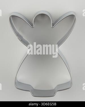 Flat steel frame in the shape of an angel Stock Photo