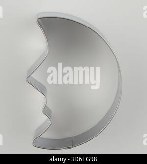 Flat steel frame in the shape of a moon Stock Photo