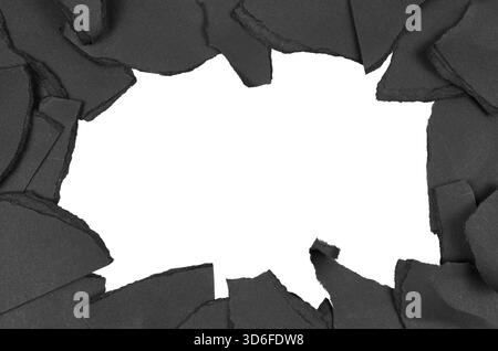 frame of black ripped or torn paper pieces texture isolated on white Stock Photo