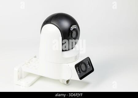 Modern white, wireless wi-fi IP cameras, CCTV Cameras for security isolated on a white background. Stock Photo