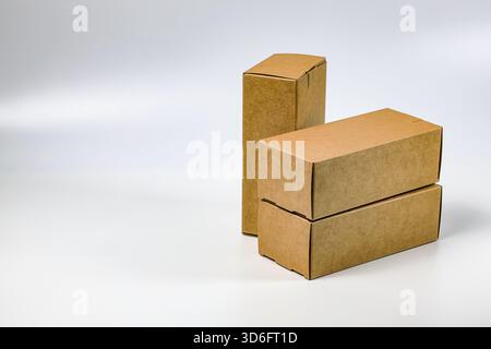 Several many rectangles Cardboard boxes for Parcel Delivery isolated on white background. Stock Photo