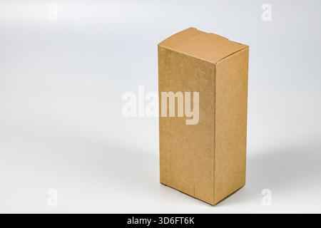 Rectangle Cardboard box for Parcel Delivery isolated on white background. Stock Photo