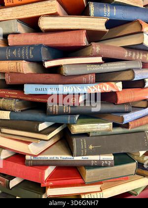 Stacks of old vintage books. Stock Photo